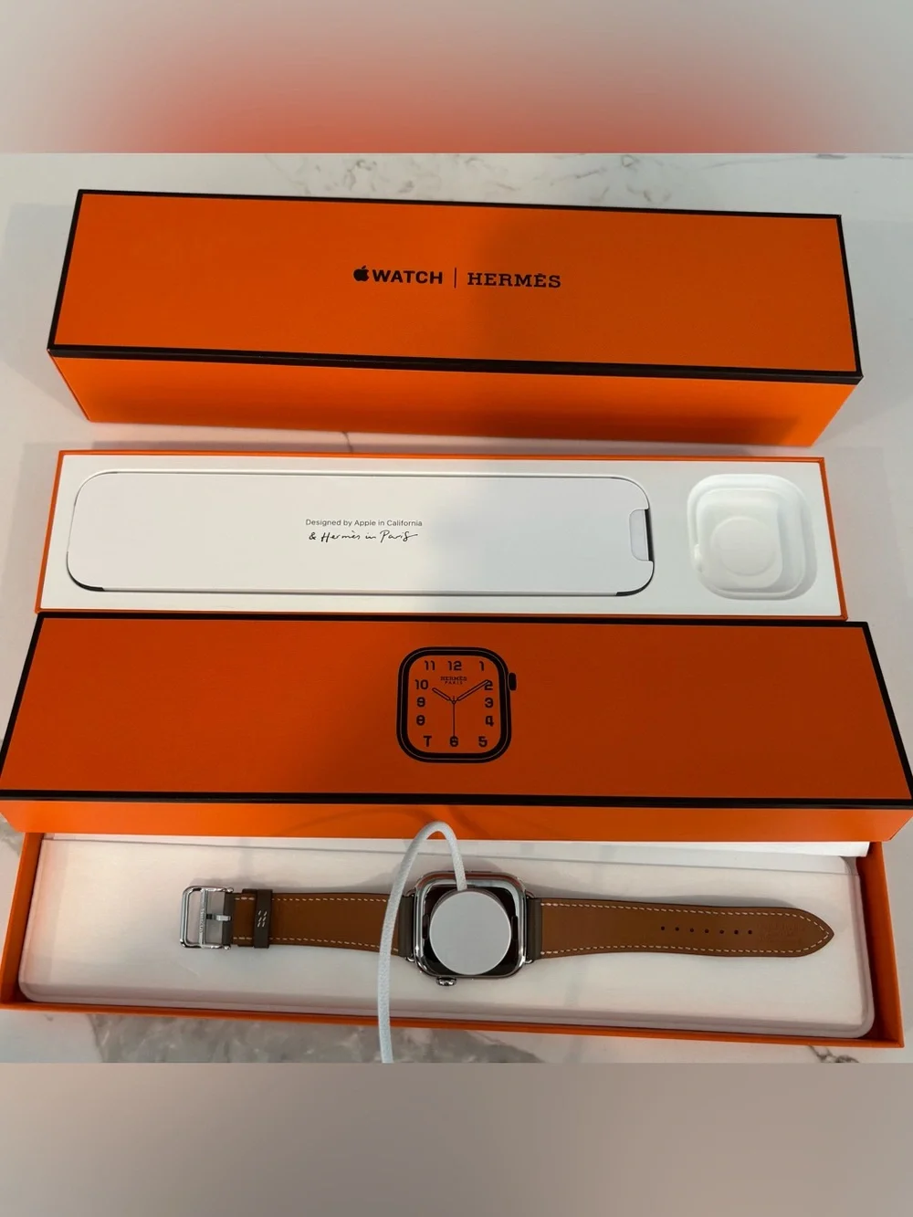 Hermes Smartwatch with Brown Leather Strap and Silver Case
